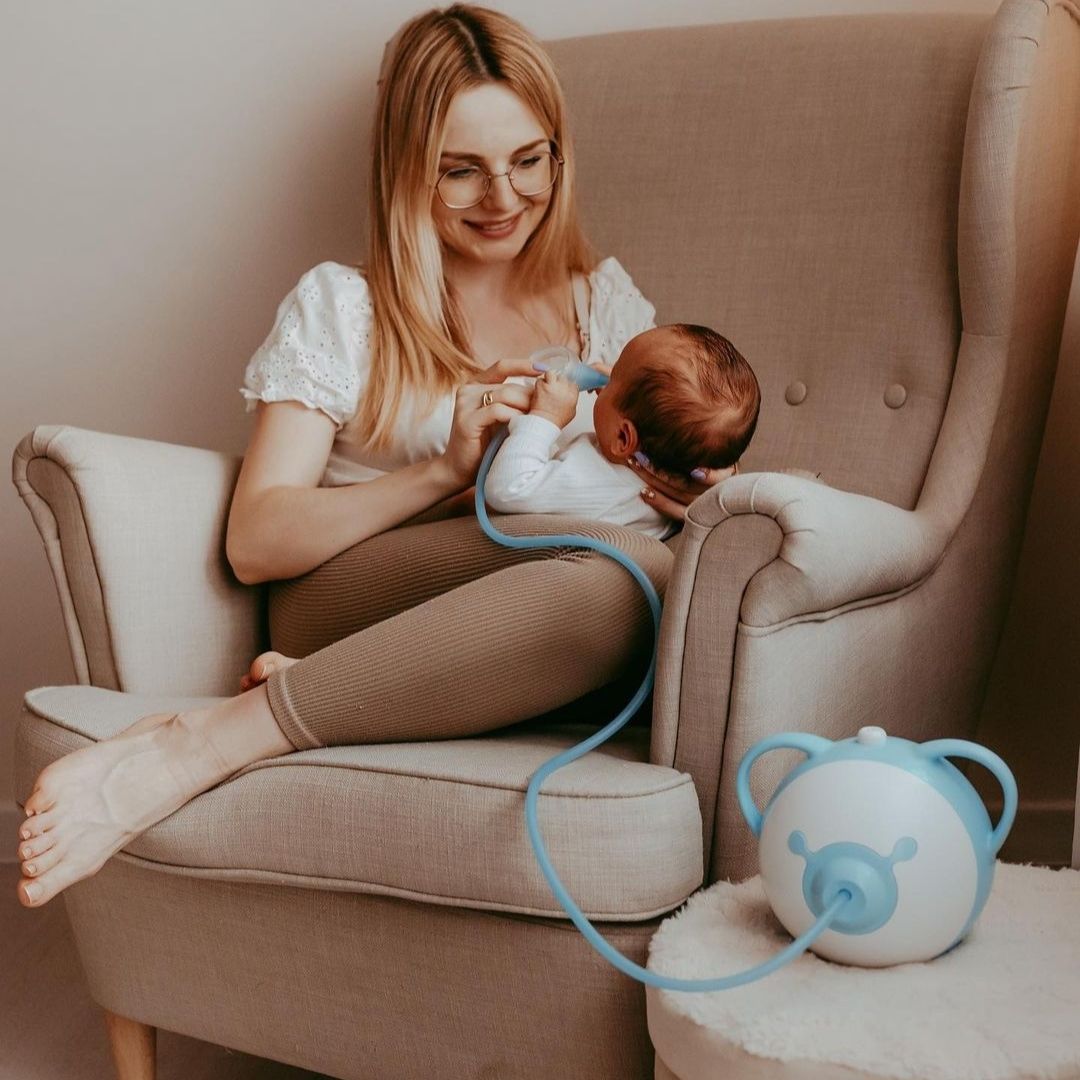 Nosiboo Pro lietošana aizlikta deguna tīrīšanai mazulim